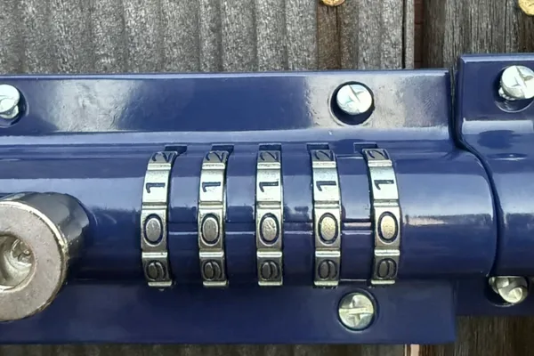 Illustration of an open toiletry bag with travel bottles, a round tin, and a toothbrush